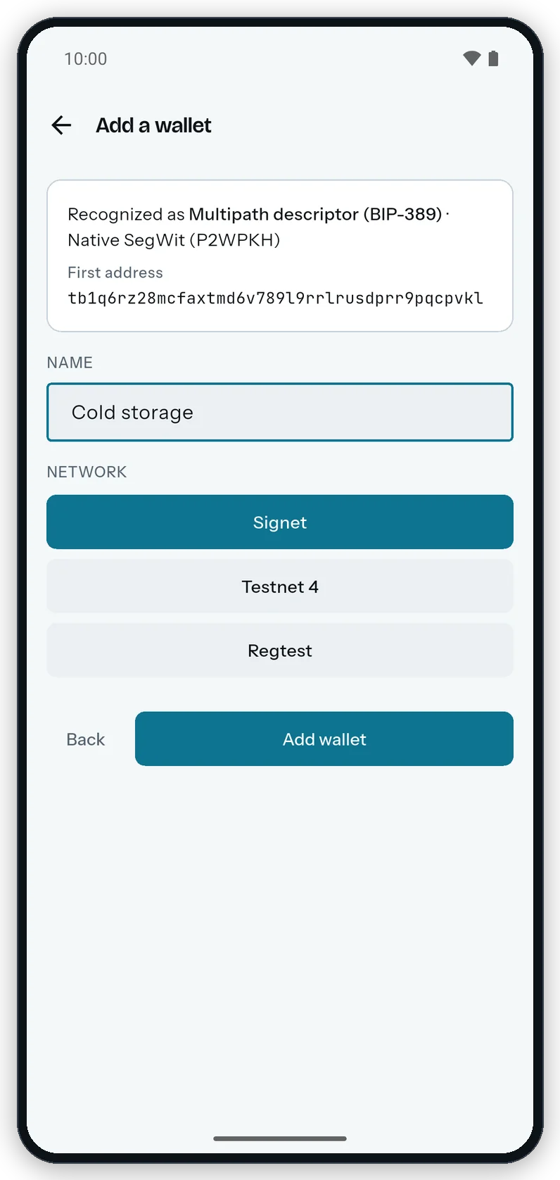 The Add a wallet screen on Android after pasting a descriptor: the Recognized as card with the first address, the Name field, the network buttons and the Add wallet button.
