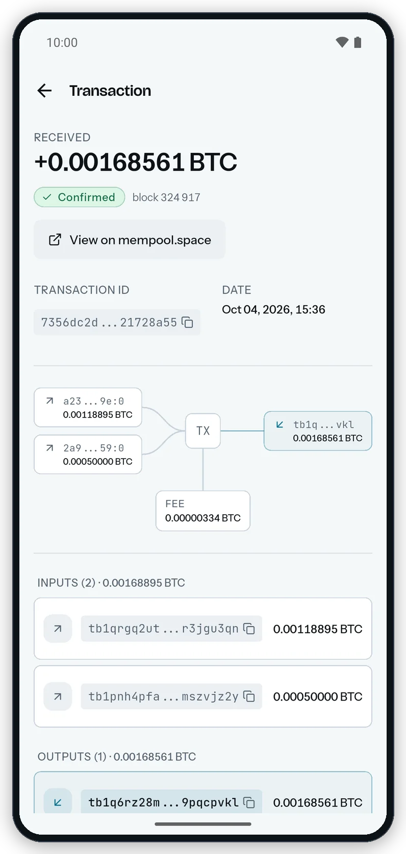 The Transaction screen on Android: the received amount, the Confirmed pill, the View on mempool.space button, the transaction id, the flow diagram, and the inputs and outputs.