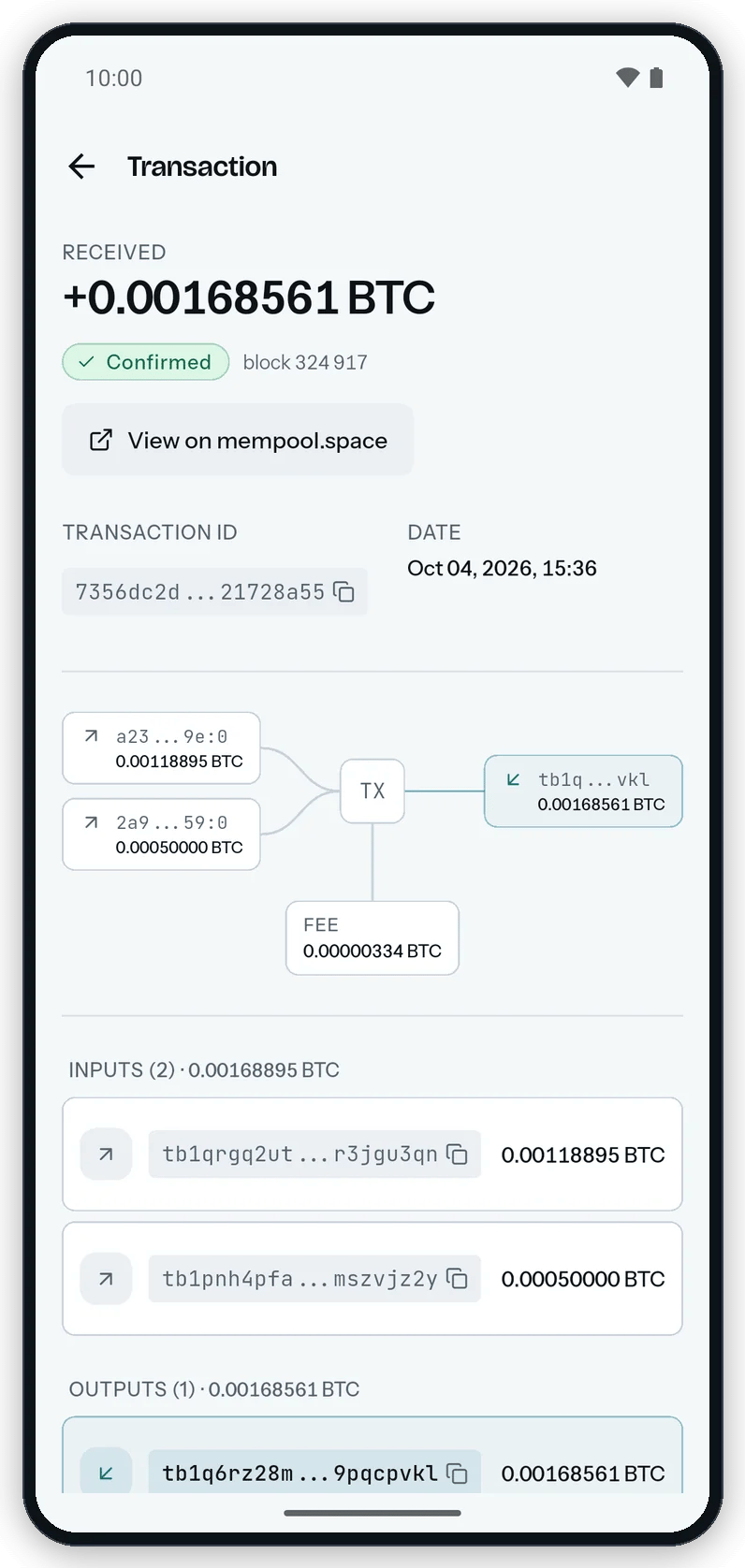 The Transaction screen on Android: the received amount, the Confirmed pill, the View on mempool.space button, the transaction id, the flow diagram, and the inputs and outputs.